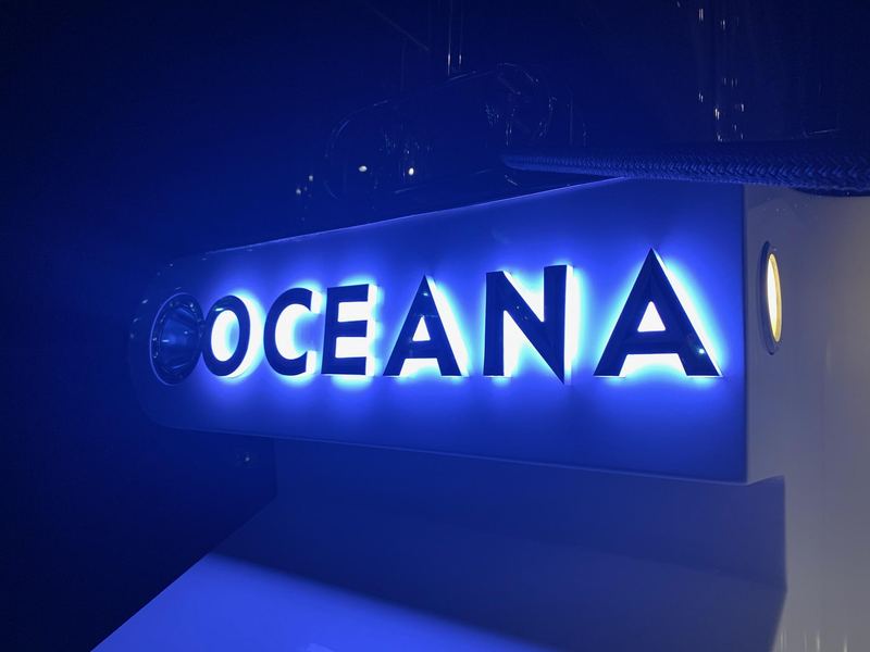 OCEANA backlit LED stainless boat name glowing at night